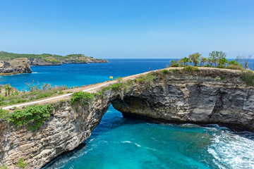 Beautiful view of natural arch at Broken beach in Nusa Penida island, Bali, Indonesia.