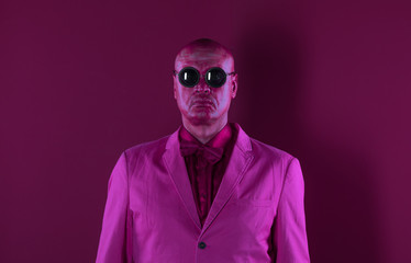 Fototapeta premium abstract portrait of a man in red paint on his face