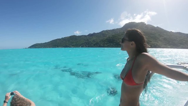 Attractive woman on boat in Tahiti