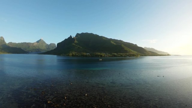 Scenic Tahiti coastal, slow motion aerial