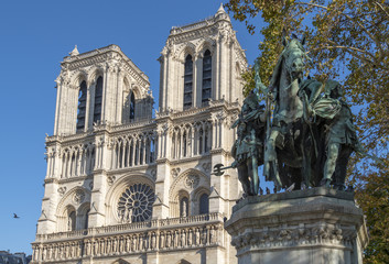 Notre Dame Cathedral with Charlemagne and his Guards statue, in Paris, France