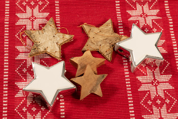 Christmas stars on red tablecloth