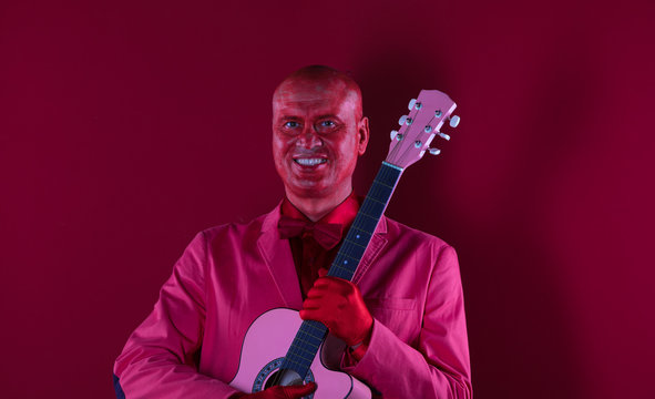 Red Man With Red Guitar