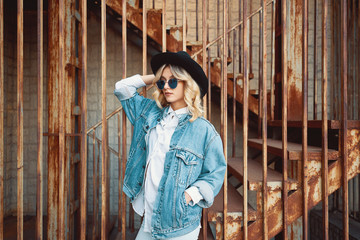 Fototapeta premium Stylish woman portrait representing urban youth lifestyle