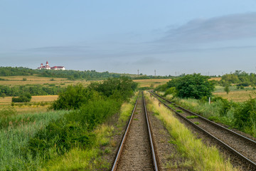 Fototapeta na wymiar Railway tracks in Romania on a summer day