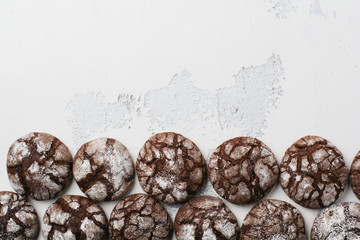 Chocolate brownie cookies in powdered sugar. Chocolate Crinkles.