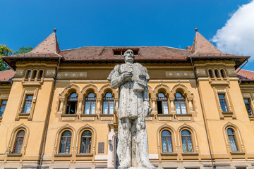 George Baritiu statue in front of the George Baritiu School in Brasov, Romania