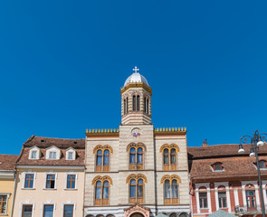 Fototapeta na wymiar Beautiful church building in the main square in Brasov, Romania