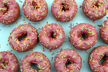 donut donuts sprinkles on doughnuts pink bright sugar strands background