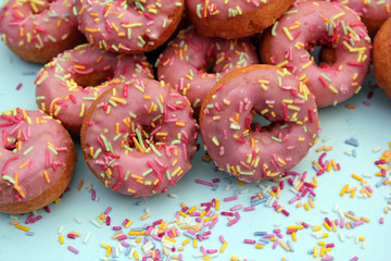 donut donuts sprinkles on doughnuts pink bright sugar strands background