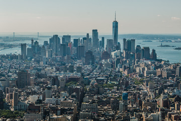 Aerial view of New York City - USA. Manhattan downtown skyline and skyscrapers from the Empire State Building in the morning.