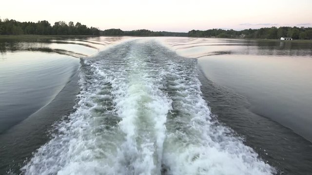 Boat wake on a river