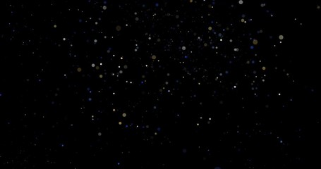 Flying dust particles on a black background