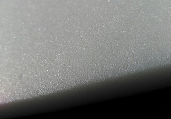 White foam sponge, pattern and texture detail.