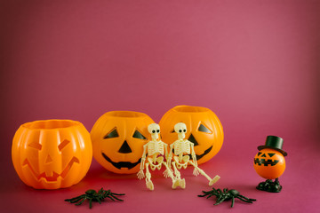 Isolated halloween toys, pumpkin, skeletons and bat