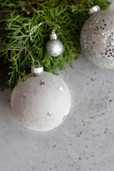 Christmas background, greeting card on grey concrete background. Christmas composition Decoration. Copy space.