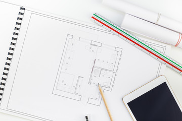 Interior designer table workplace with house plan