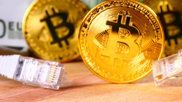 Cryptocurrency bitcoin coins detailed close up. Virtual money, blockchain business, internet finances concept
