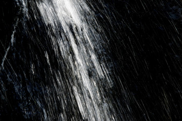 Water splash against black background