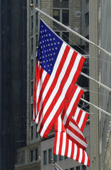 Stars And Stripes Flag Hanging On Wall Street