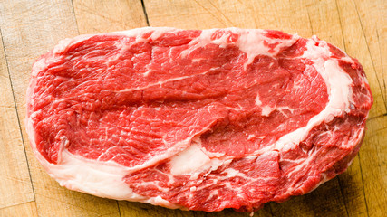 Raw marbled beef on a cutting board