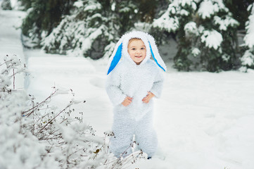 a little boy dressed as rabbit meets new year