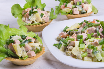 Traditional russian salad Olivier in tartlet