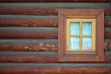 A window in old wooden house as background