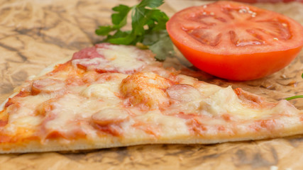 Pizza with cheese and tomatoes