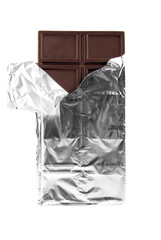 Dark chocolate in foil on a white background.