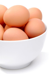 White Bowl Of Brown Eggs