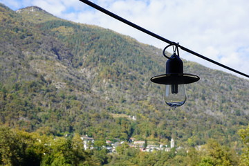 A lamp in front of mountain 