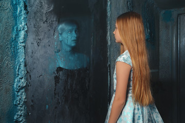 Lunatic young girl looking in the mirror and seeing in reflection a ghost of murdered woman