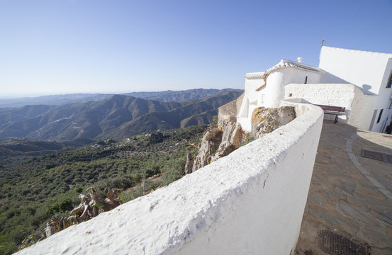 Comares, white village up on the hill of Malaga mountains, Andalusia, Spain. Townhouses