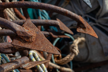 Anchor used for anchoring fishing nets. Fishing accessories in the port of central europe.