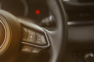 Obraz na płótnie Canvas Car inside. New Modern interior of premium car with leather seats.