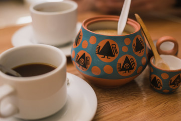 Cup Of Coffee And Sugar On A Table