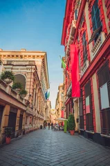 Fototapeten Beautiful cozy streets of Genoa in  summer day, Liguria, Italy © Olena Zn