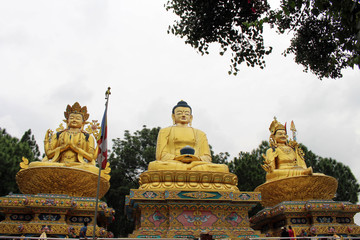The golden Buddha statues and stupa at Amideva Park on the foothill of Swayambhunath