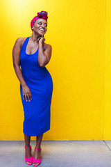 millennial black woman with yellow background