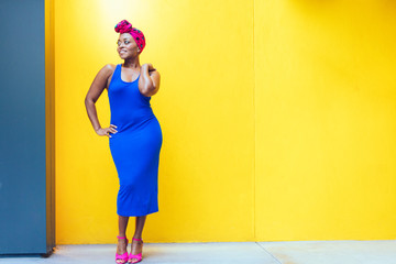 millennial black woman with yellow background