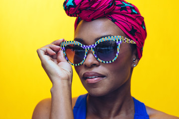 millennial black woman with yellow background