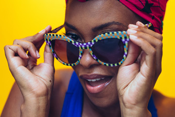 millennial black woman with yellow background