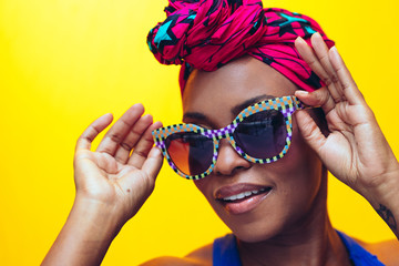 millennial black woman with yellow background