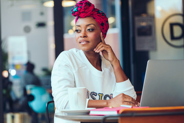Black woman working on laptop