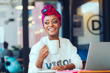 Black woman working on laptop