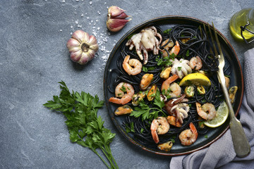 Black seafood spaghetti.Top view with copy space.