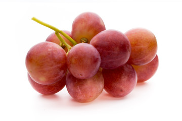 Ripe red grape isolated on white.