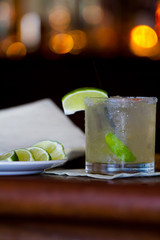Drink and limes on bar and bokeh 1