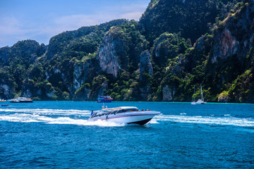 Motor boats and cliff rocks, Phi Phi Don island, Andaman sea, Kr